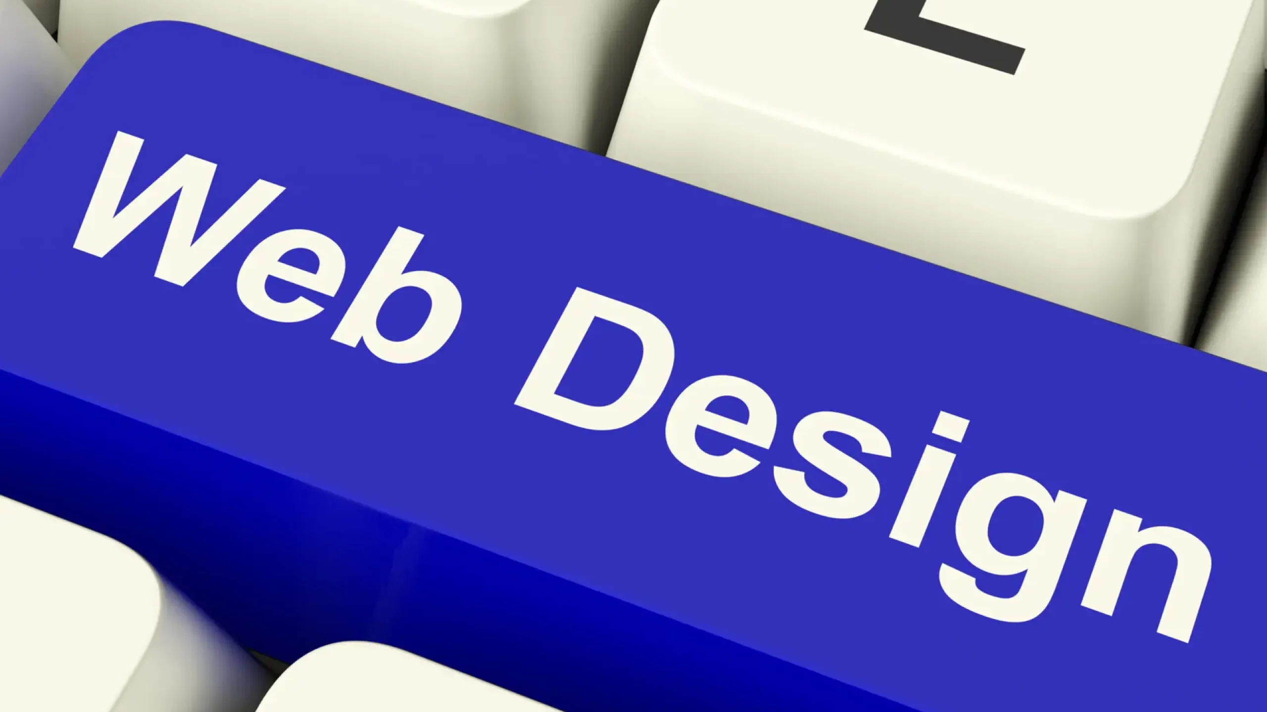 Web Design Computer Key Shows Internet Or Online Graphic Designing